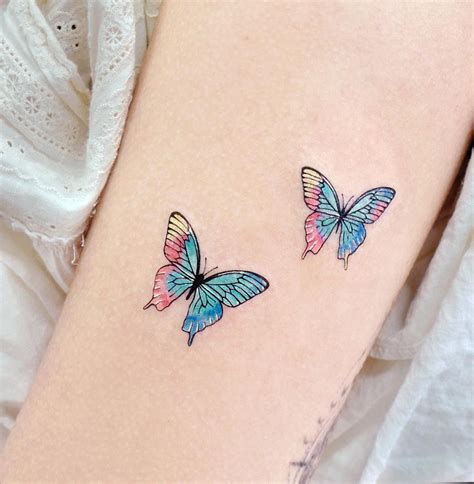 2 butterfly tattoos|More.